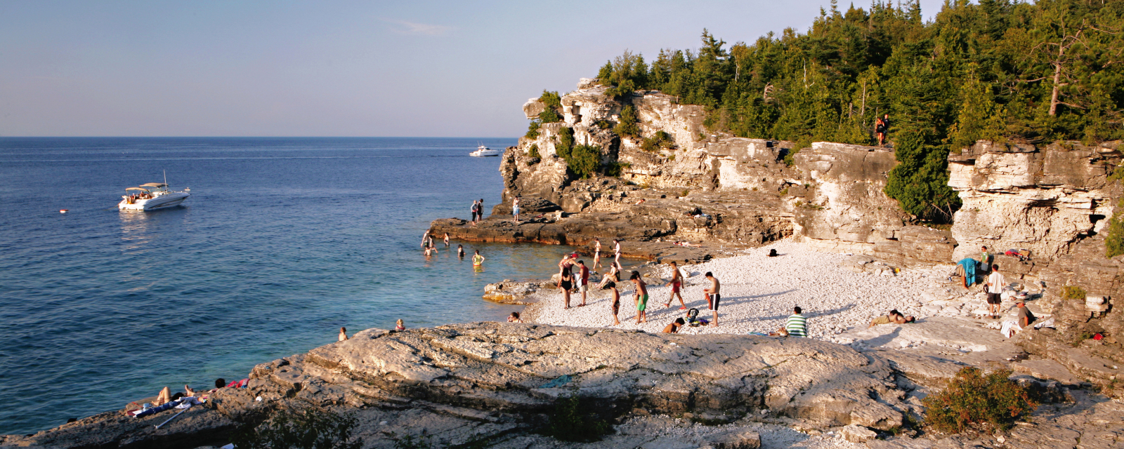 People on the beach at the Grotto in Bruce National Park