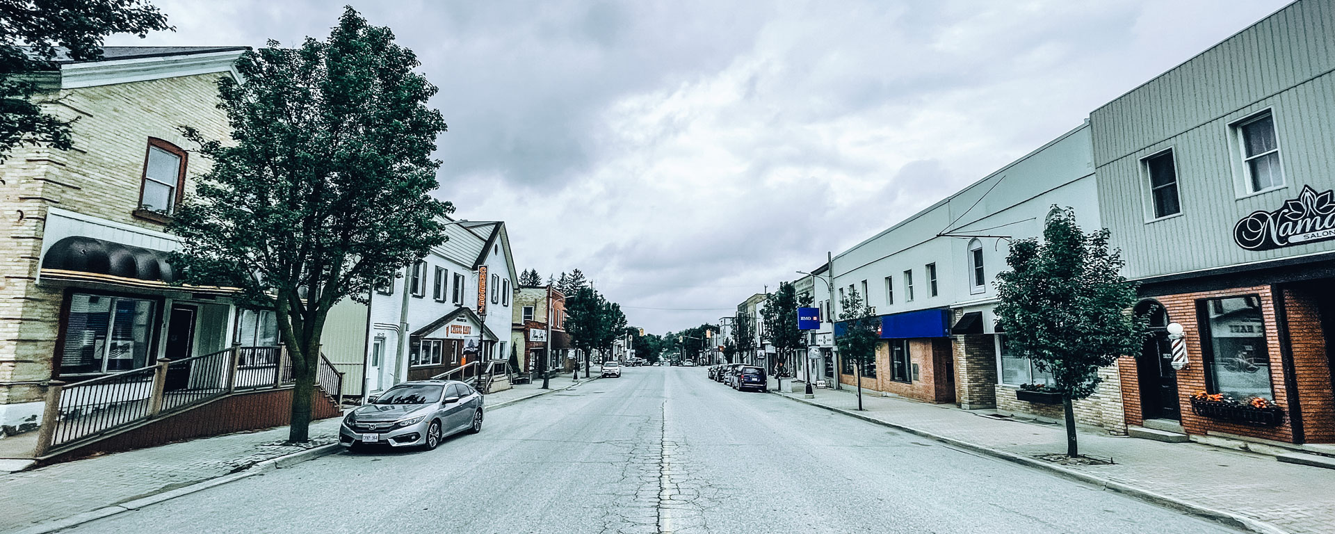 wide shot of a main street in Mildmay with small businesses lining the street