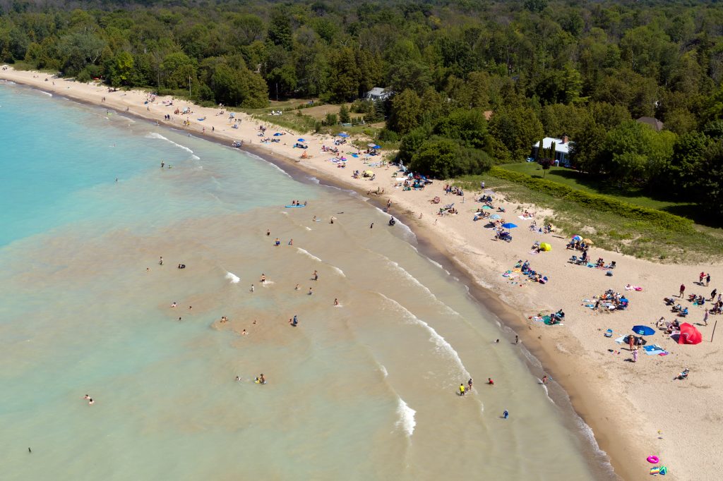 Aerial photo of busy beach in Point Clark
