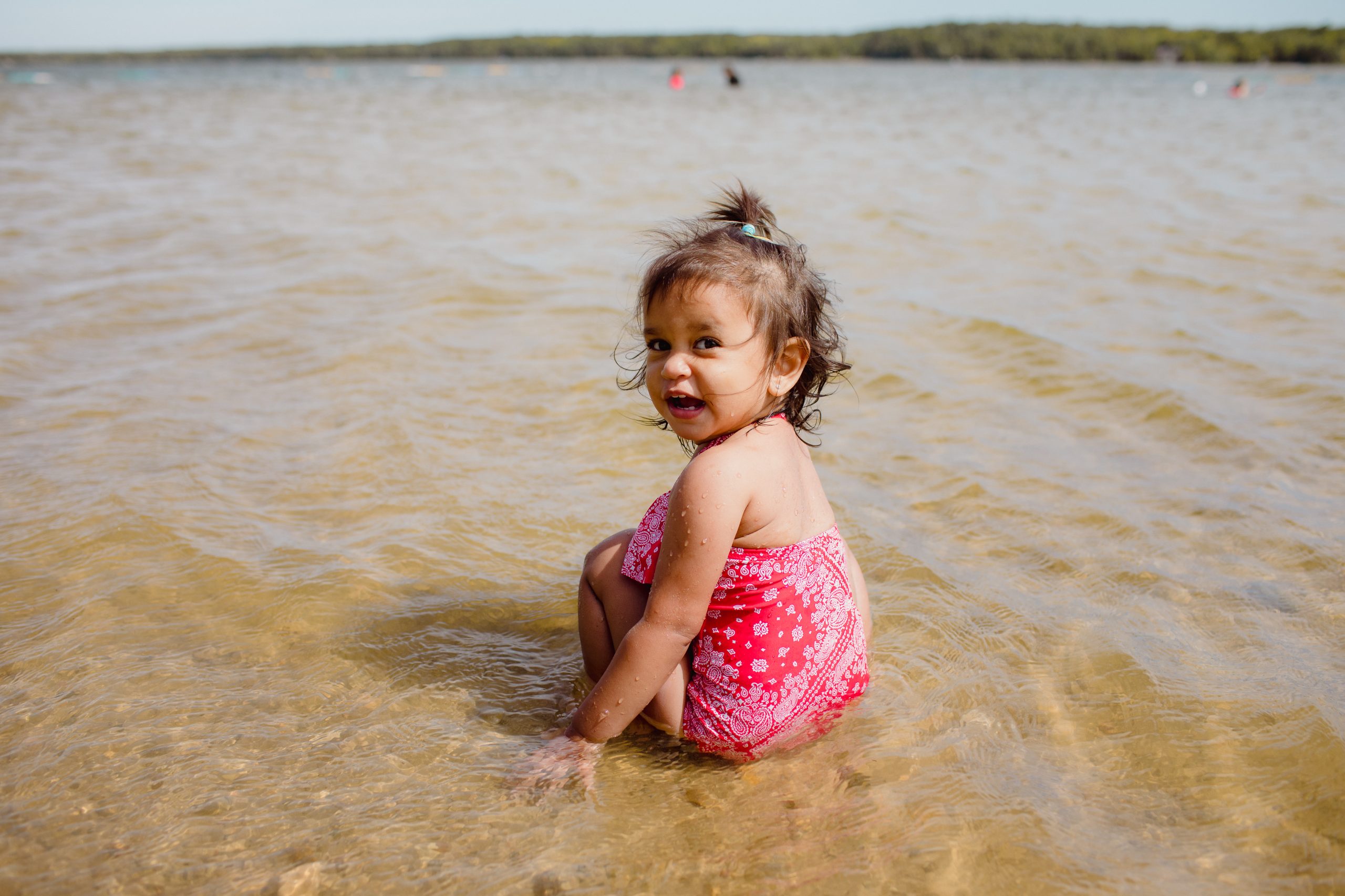 Child on beach in Bruce County